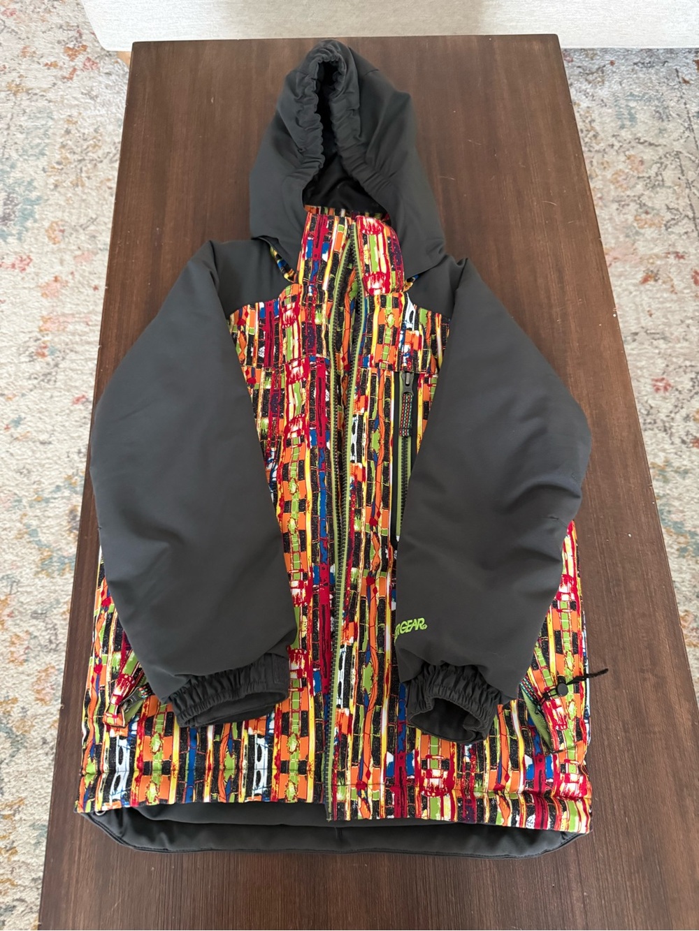 Boulder Gear Multicolor Patterned Jacket with Black Sleeves and obermeyer bibs